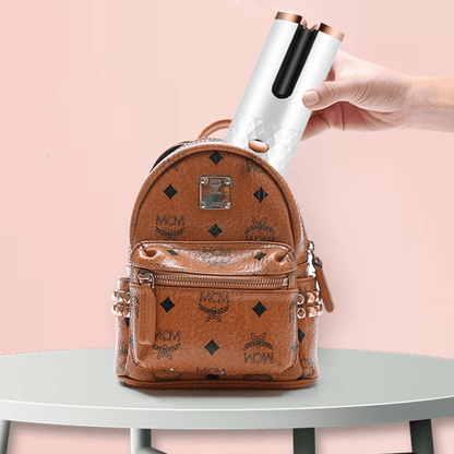 Skorter | Cordless automatic rotating curling iron