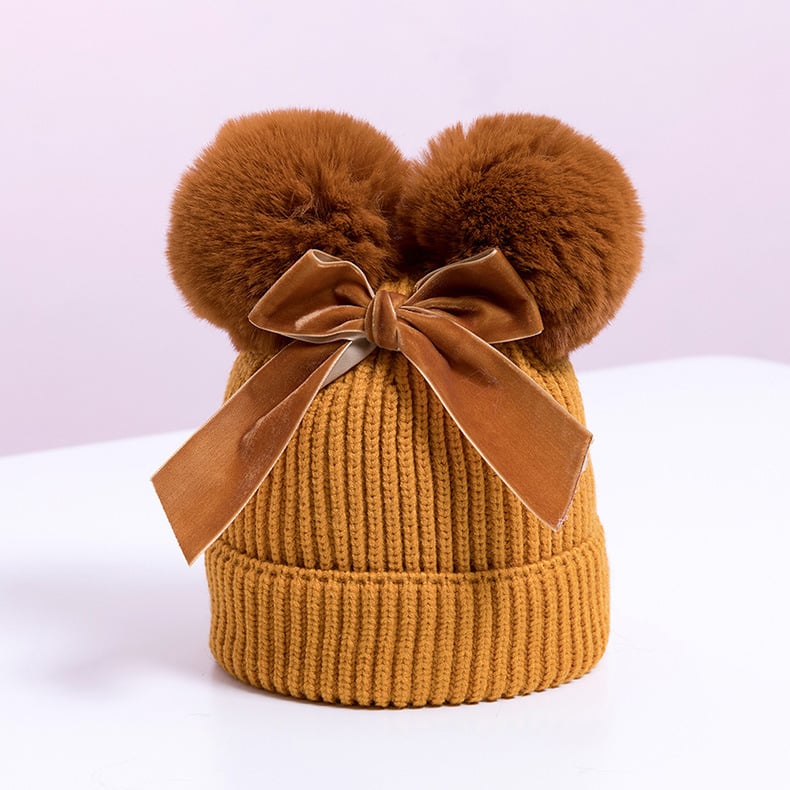 Skorter | Baby hat with double ball bow