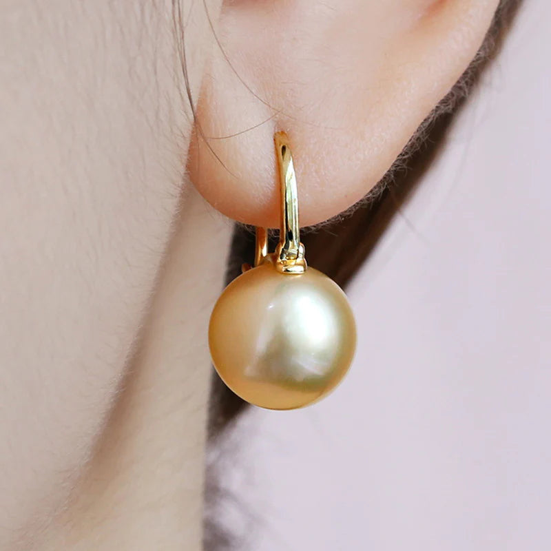 Skorter | Black Pearl Earrings  Available in White Champagne Grey Gold and Black  Pearl Dangle Earrings