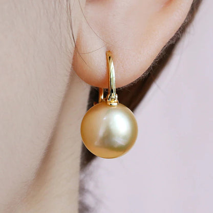 Skorter | Black Pearl Earrings  Available in White Champagne Grey Gold and Black  Pearl Dangle Earrings
