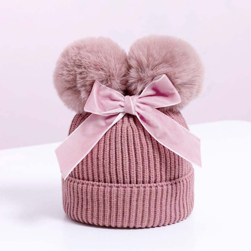 Skorter | Baby hat with double ball bow