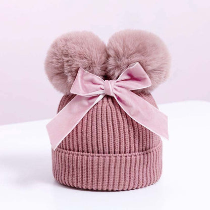 Skorter | Baby hat with double ball bow