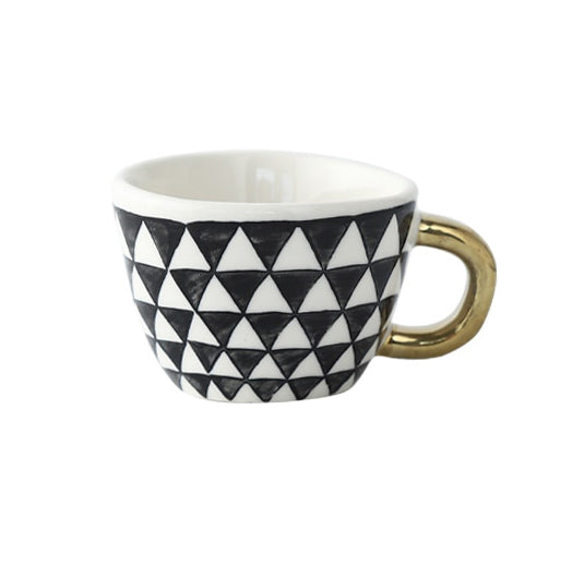 Skorter | Cup with abstract geometric pattern and gold handle