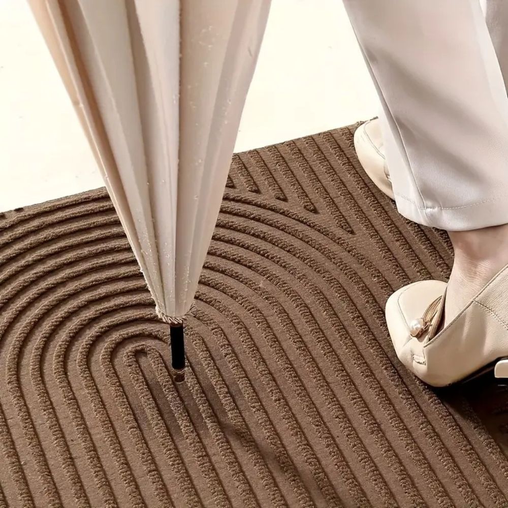 Skorter | Curved Thread Line Door Mat