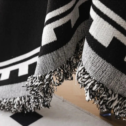 Skorter | Elegant Black and White Sofa Cover Protector