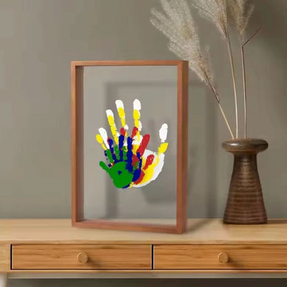 Skorter | Baby memory frame made of wood with clay for hand & foot prints