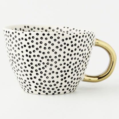 Skorter | Cup with abstract geometric pattern and gold handle