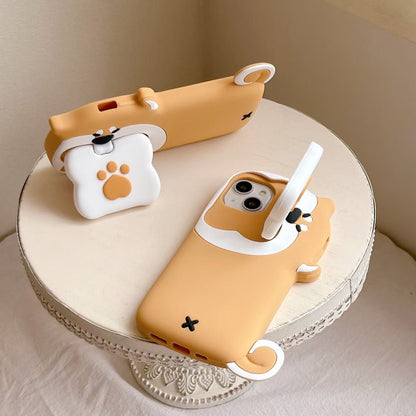 Skorter | Cute Dog Bite Silicone iPhone Case with 3D Bone Stand – Brown Puppy Design