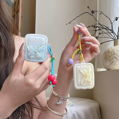 Skorter | Butterfly Charm AirPods Case – Sweet Pearl Cherry Keychain