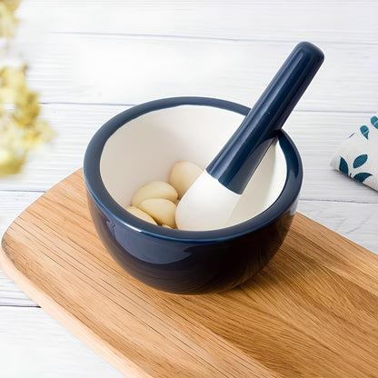 Skorter and a ceramic kitchen pestle