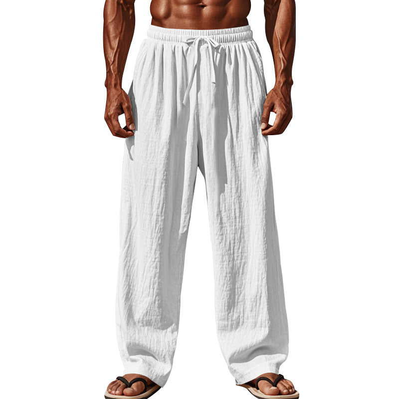 Luftiga sommarcargobyxor för män med resår i midjan och praktiska sidofickor.