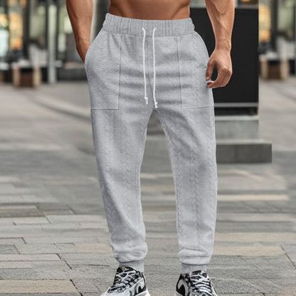 Men's sporty joggers with textured design and elastic waistband Skorter