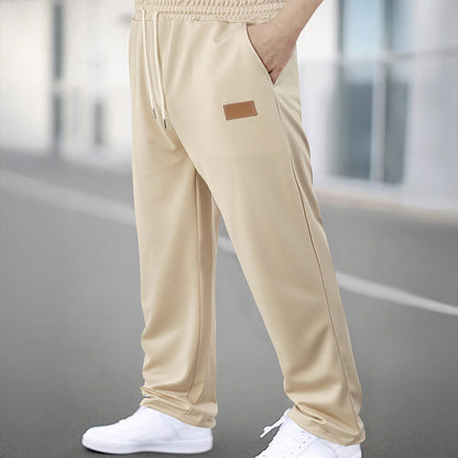 Men's Sporty Jogging Pants with Elastic Waistband and Practical Pockets Skorter