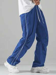 Men's casual sports pants with elastic waistband and side seams Skorter
