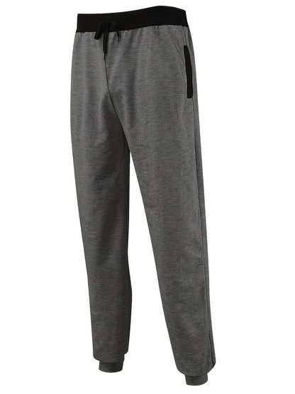 Men's sporty sweatpants with elastic waistband and side pockets Skorter