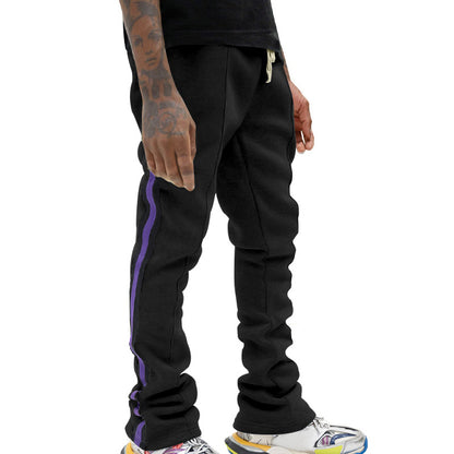 Men's sporty sweatpants with side stripes and adjustable waistband Skorter