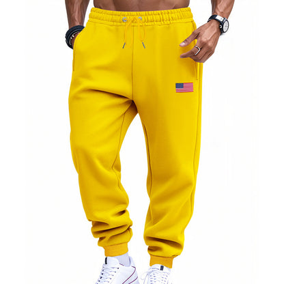 Men's sporty sweatpants with elastic waistband and practical side pockets Skorter