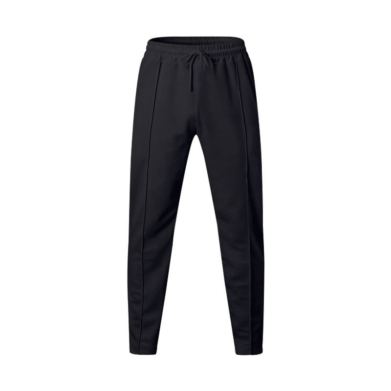 Men's sporty jogging pants with elastic waistband and side inserts Skorter