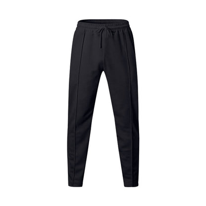 Men's sporty jogging pants with elastic waistband and side inserts Skorter