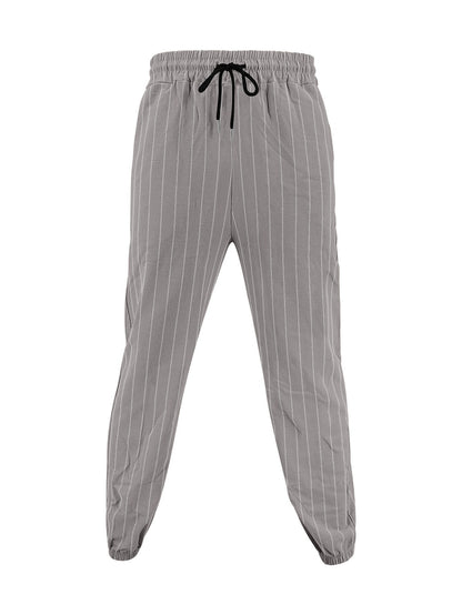 Men's elegant leisure pants with elastic waistband and side stripes Skorter