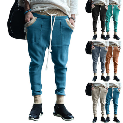 Men's sporty jogging pants with comfortable side pockets and elastic waistband Skorter