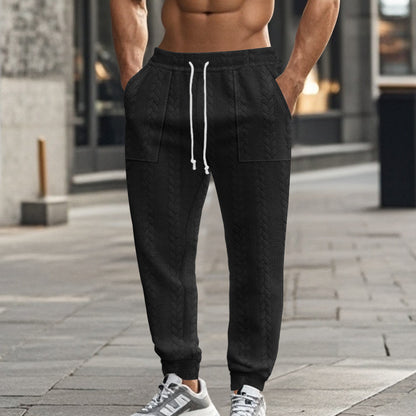 Men's sweatpants with textured pattern and practical pockets Skorter