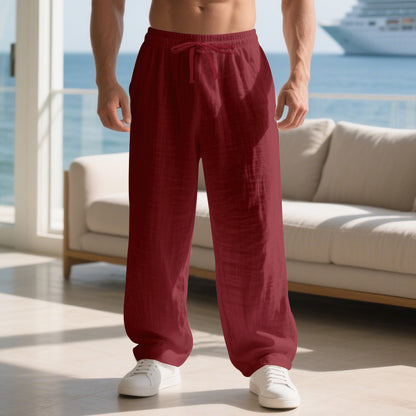 Men's relaxed linen trousers with elastic waistband and loose fit Skorter