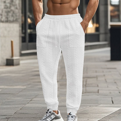 Men's sweatpants with textured pattern and practical pockets Skorter