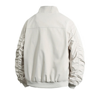 Men's transitional jacket with high collar and practical zip pockets Skorter