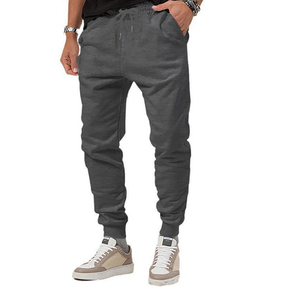 Men's sporty jogging pants with adjustable drawstring and elastic cuffs Skorter