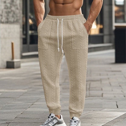 Men's sweatpants with textured pattern and practical pockets Skorter