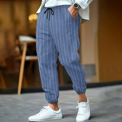 Men's elegant leisure pants with elastic waistband and side stripes Skorter
