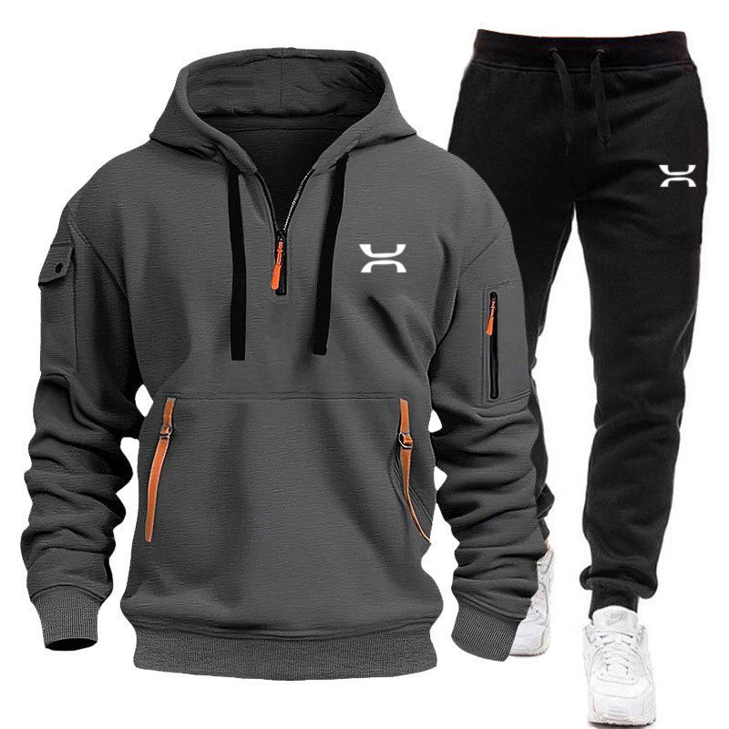 Men's sporty hoodie and tracksuit set with functional pockets and sporty cut Skorter