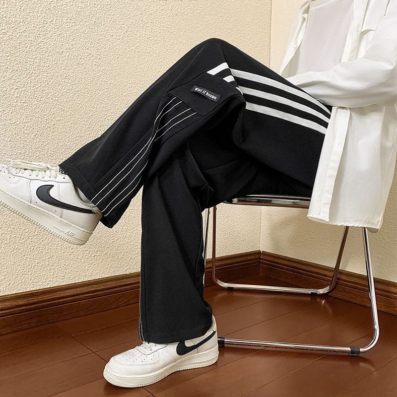 Men's sporty casual pants with modern side details Skorter