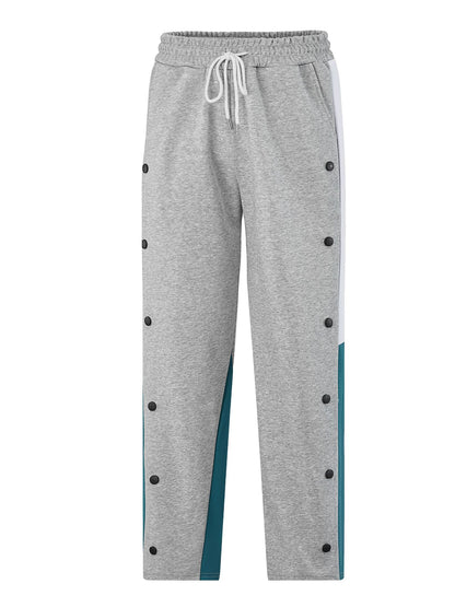 Men's sporty training pants with snap button closure and breathable structure Skorter