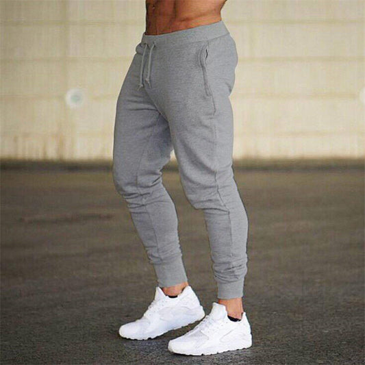 Men's sporty jogging pants with modern cut and practical pockets Skorter