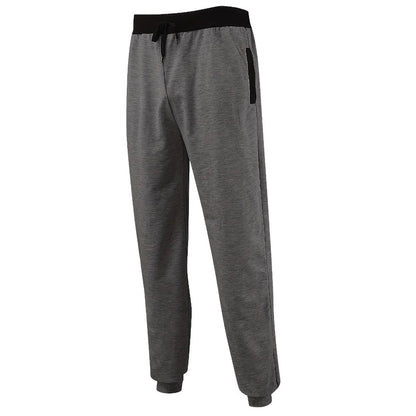 Men's sporty jogging pants with incorporated side pockets and adjustable drawstring Skorter