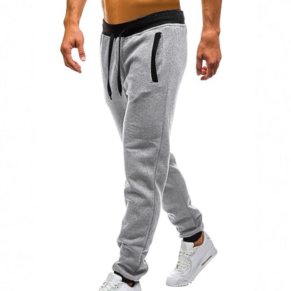 Men's sporty jogging pants with incorporated side pockets and adjustable drawstring Skorter