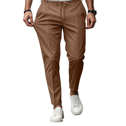 Men's stylish sports trousers with elastic waistband and practical side pockets Skorter