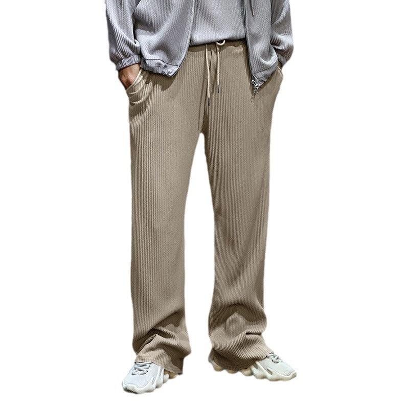 Men's sporty ribbed training pants with adjustable waistband and side pockets Skorter