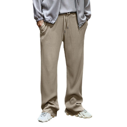 Men's sporty ribbed training pants with adjustable waistband and side pockets Skorter