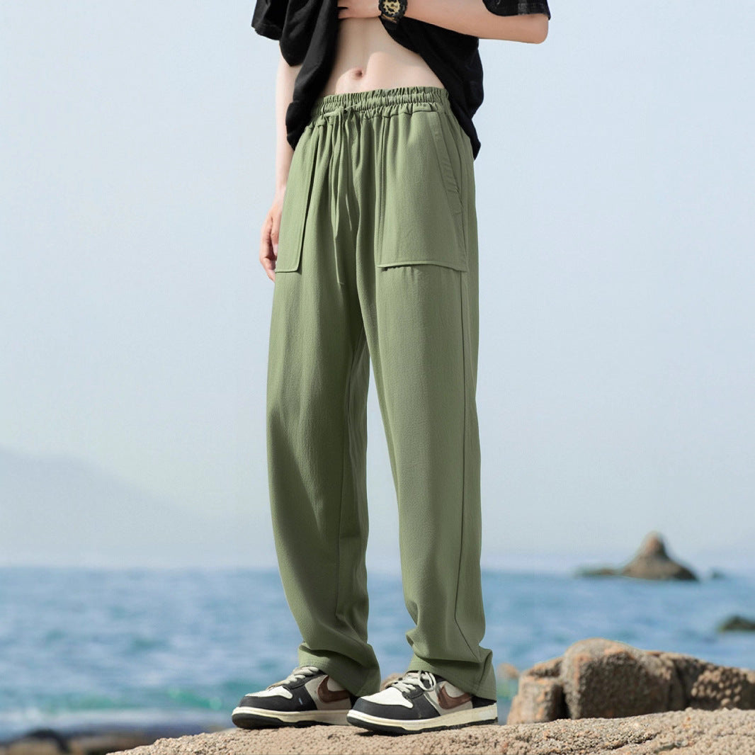 Men's sporty leisure pants with side pockets and elastic waistband Skorter