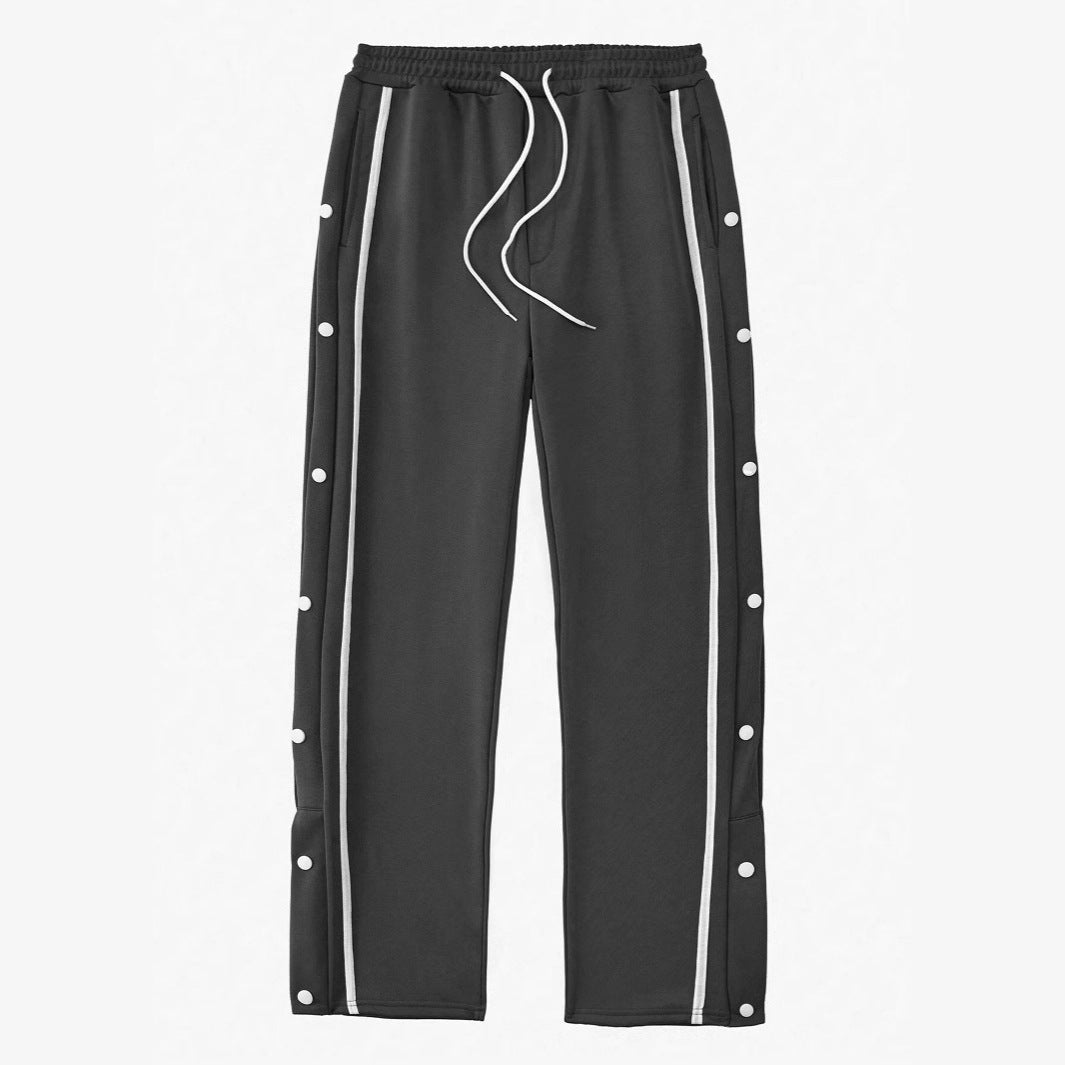 Men's sporty training pants with snap button details and elastic waistband Skorter