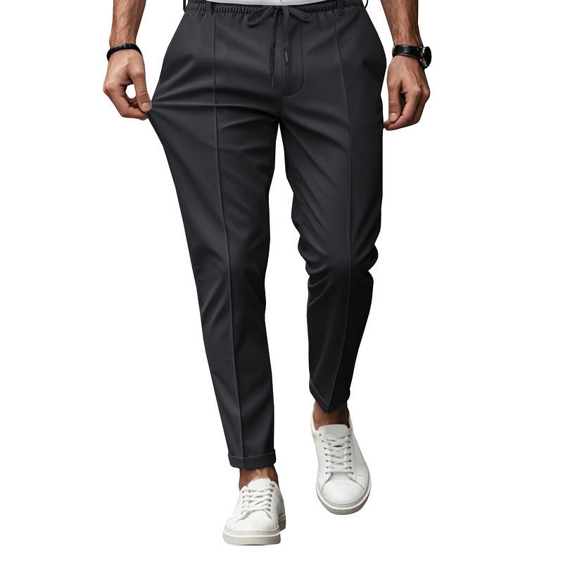 Men's stylish sports trousers with elastic waistband and practical side pockets Skorter