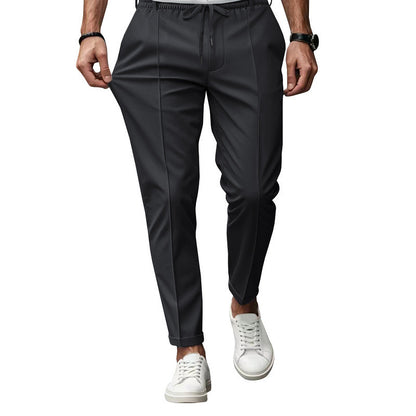 Men's stylish sports trousers with elastic waistband and practical side pockets Skorter