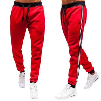 Men's sporty sweatpants with side stripes Skorter
