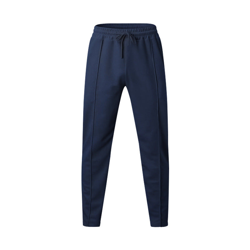 Men's sporty jogging pants with elastic waistband and side inserts Skorter