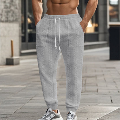 Men's sweatpants with textured pattern and practical pockets Skorter