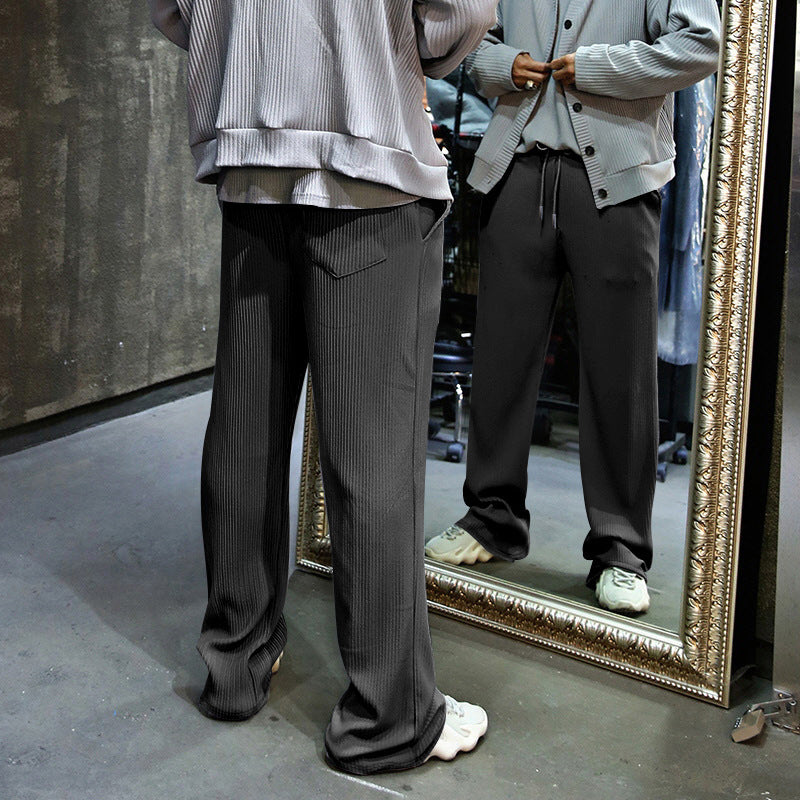 Men's sporty ribbed training pants with adjustable waistband and side pockets Skorter