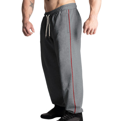 Men's sporty jogging pants with adjustable waistband and side pockets Skorter